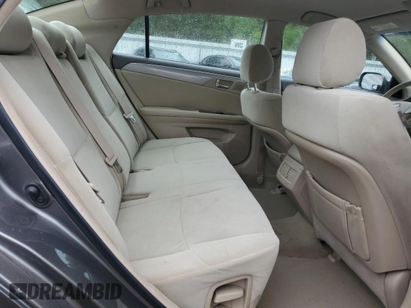 2005 Toyota Avalon XL z VIN 4T1BK36BX5U017137, wystawiony jako Copart lot #57623495 z przebiegiem 130 875 mil mil oraz Szkoda całkowita • Salvage title. Historia ofert i sprzedaży dostępna na DreamBid. Obrazek 10.