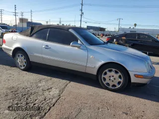 1999 Mercedes-Benz CLK 320/430 z VIN WDBLK65G2XT024808, wystawiony jako Copart lot #85336294 z przebiegiem 289 898 mil mil oraz Szkoda całkowita • Salvage title. Historia ofert i sprzedaży dostępna na DreamBid. Obrazek 4.