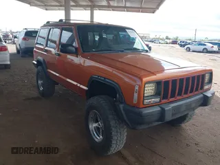 1997 Jeep Cherokee Sport with VIN 1J4FJ68SXVL517077, listed as a IAAI auction lot 42350553 with Not provided miles and . Bid and sale history available at DreamBid. Image 1.