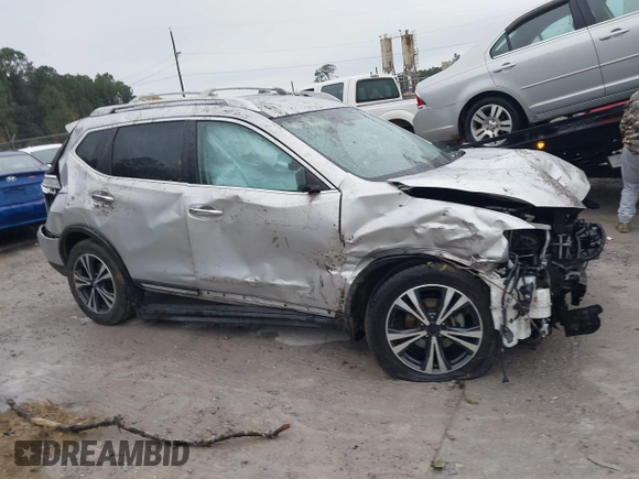 2017 Nissan Rogue SV with VIN JN8AT2MT7HW143178, listed as a IAAI auction lot 41015343 with 139,828 mi miles and . Bid and sale history available at DreamBid. Image 14.