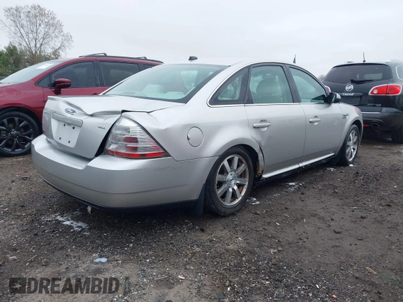 2008 Ford Taurus SEL with VIN 1FAHP24W68G122802, listed as a IAAI auction lot 42020217 with 168,265 mi miles. Bid and sale history available at carsss.com. Image 4.