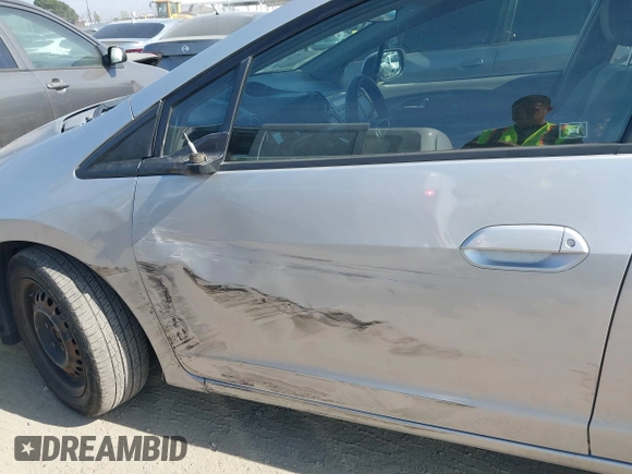 2012 Honda Insight LX с VIN JHMZE2H56CS001570, выставлен на аукционе IAAI как лот 41461236 с пробегом 129 431 миль миль и . История ставок и продаж доступна на DreamBid. Изображение 6.