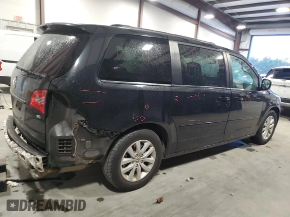 2014 Volkswagen Routan SE with VIN 2C4RVABG1ER134618, listed as a Copart auction lot 81744564 with 121,136 mi miles and Salvage title. Bid and sale history available at DreamBid. Image 3.