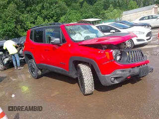 2017 Jeep Renegade Trailhawk z VIN ZACCJBCB2HPG00852, wystawiony jako IAAI lot #42334461 z przebiegiem 151 680 mil mil oraz . Historia ofert i sprzedaży dostępna na DreamBid. Obrazek 1.