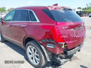 2017 Cadillac XT5 Luxury FWD z VIN 1GYKNBRS3HZ293677, wystawiony jako IAAI lot #42043025 z przebiegiem 89 975 mil mil oraz . Historia ofert i sprzedaży dostępna na DreamBid. Obrazek 17.