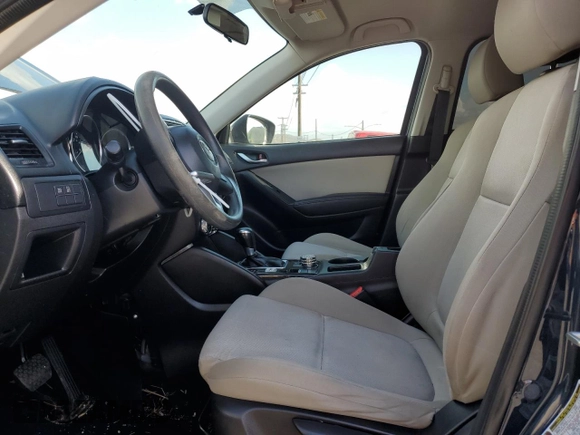 2016 Mazda CX-5 Sport with VIN JM3KE2BY0G0730906, listed as a Copart auction lot 51611865 with 207,166 mi miles and Salvage Title. Bid and sale history available at carsss.com. Image 7.