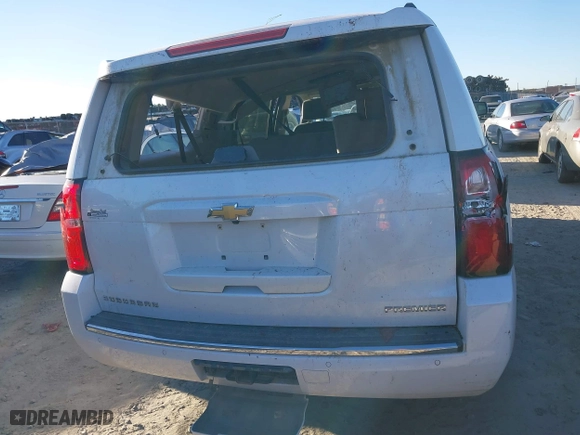 2019 Chevrolet Suburban Premier with VIN 1GNSCJKC0KR293658, listed as a IAAI auction lot 40563834 with 153,619 mi miles. Bid and sale history available at carsss.com. Image 16.