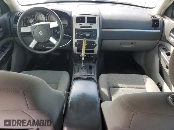 2010 Dodge Charger SXT with VIN 2B3CA3CVXAH191833, listed as a Copart auction lot 45682505 with 106,540 mi miles and Salvage Title. Bid and sale history available at DreamBid. Image 8.