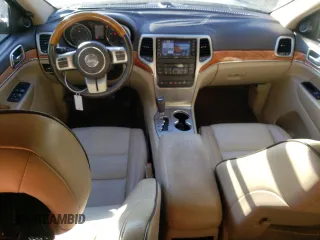 2011 Jeep Grand Cherokee Overland with VIN 1J4RS6GG7BC646610, listed as a Copart auction lot 79931614 with 188,601 mi miles and Salvage Title. Bid and sale history available at DreamBid. Image 8.