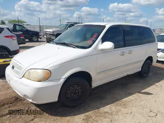 2005 Kia Sedona LX with VIN KNDUP131456634276, listed as a IAAI auction lot 42090209 with 185,754 mi miles and . Bid and sale history available at DreamBid. Image 2.