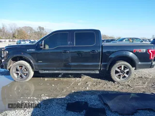 2016 Ford F-150 XLT with VIN 1FTEW1EG3GFC12785, listed as a IAAI auction lot 41415682 with 211,174 mi miles and . Bid and sale history available at DreamBid. Image 14.