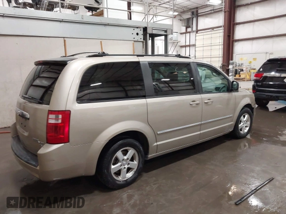 2009 Dodge Grand Caravan SXT z VIN 2D8HN541X9R652097, wystawiony jako IAAI lot #42370946 z przebiegiem 189 911 mil mil oraz . Historia ofert i sprzedaży dostępna na DreamBid. Obrazek 4.
