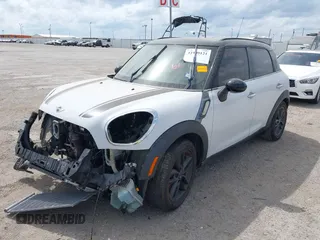 2012 MINI Countryman S with VIN WMWZC3C57CWL87877, listed as a IAAI auction lot 41909121 with Not provided miles and . Bid and sale history available at DreamBid. Image 2.