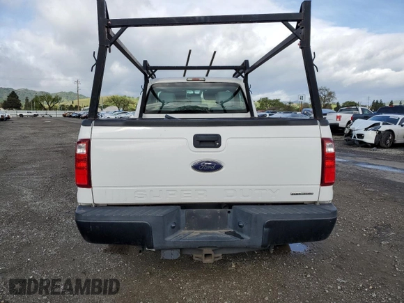2014 Ford Super Duty F-250 SRW XL with VIN 1FTBF2A61EEB66169, listed as a Copart auction lot 49995335 with 122,399 mi miles and Salvage Title. Bid and sale history available at carsss.com. Image 6.