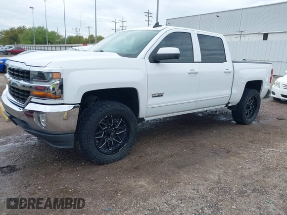 2018 Chevrolet Silverado 1500 LT with VIN 3GCPCREC7JG402401, listed as a IAAI auction lot 41880462 with 128,995 mi miles and . Bid and sale history available at DreamBid. Image 21.