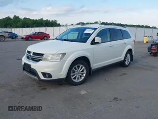 2018 Dodge Journey SXT with VIN 3C4PDCBG4JT369687, listed as a IAAI auction lot 42269696 with 131,306 mi miles and . Bid and sale history available at DreamBid. Image 2.