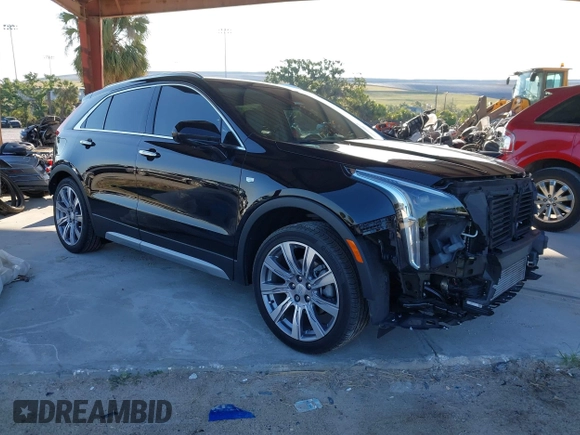 2020 Cadillac XT4 FWD Premium Luxury with VIN 1GYFZCR42LF144359, listed as a IAAI auction lot 42012677 with 34,490 mi miles and . Bid and sale history available at carsss.com. Image 1.