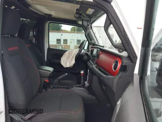 2021 Jeep Wrangler Unlimited Rubicon with VIN 1C4HJXFG7MW527498, listed as a IAAI auction lot 42393520 with 18,085 mi miles and . Bid and sale history available at DreamBid. Image 5.