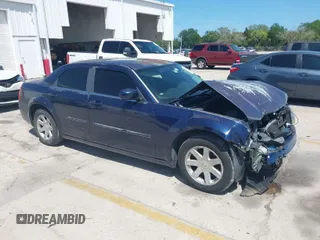 2005 Chrysler 300 with VIN 2C3JA53G25H167944, listed as a IAAI auction lot 41963114 with 196,635 mi miles. Bid and sale history available at carsss.com. Image 1.