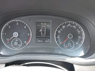 2014 Volkswagen Passat SE z VIN 1VWBN7A3XEC068708, wystawiony jako IAAI lot #42439517 z przebiegiem 144 563 mil mil oraz . Historia ofert i sprzedaży dostępna na DreamBid. Obrazek 7.