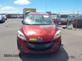 2012 Mazda 5 Touring with VIN JM1CW2CLXC0113181, listed as a IAAI auction lot 42653061 with 94,441 mi miles and . Bid and sale history available at DreamBid. Image 6.