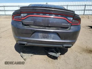 2015 Dodge Charger SXT z VIN 2C3CDXHG3FH800988, wystawiony jako Copart lot #54221905 z przebiegiem 134 098 mil mil oraz Szkoda całkowita • Salvage title. Historia ofert i sprzedaży dostępna na DreamBid. Obrazek 6.