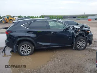 2021 Lexus NX 300 z VIN JTJDARDZ9M2248170, wystawiony jako IAAI lot #42523061 z przebiegiem 53 430 mil mil oraz . Historia ofert i sprzedaży dostępna na DreamBid. Obrazek 14.