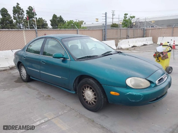 1996 Mercury Sable LS with VIN 1MELM53S0TG600877, listed as a IAAI auction lot 42063937 with 200,405 mi miles. Bid and sale history available at carsss.com. Image 1.