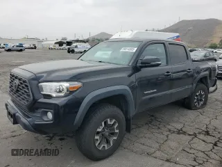 2020 Toyota Tacoma SR5 with VIN 3TMCZ5AN5LM312844, listed as a Copart auction lot 59514505 with 69,626 mi miles and Salvage title. Bid and sale history available at DreamBid. Image 1.