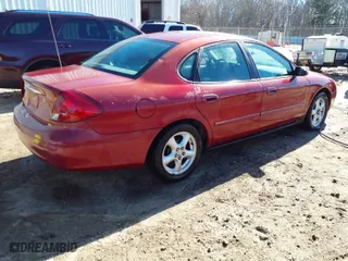 2003 Ford Taurus SE Standard with VIN 1FAFP53UX3A138702, listed as a IAAI auction lot 41826903 with 213,487 mi miles. Bid and sale history available at carsss.com. Image 4.