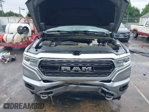 2023 Ram 1500 Limited with VIN 1C6SRFHT1PN531759, listed as a IAAI auction lot 42323882 with 47,809 mi miles and . Bid and sale history available at DreamBid. Image 10.
