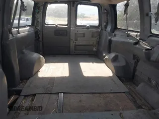 2005 Chevrolet Express Passenger with VIN 1GAHG35U151169241, listed as a IAAI auction lot 42586648 with 385,258 mi miles and . Bid and sale history available at DreamBid. Image 8.