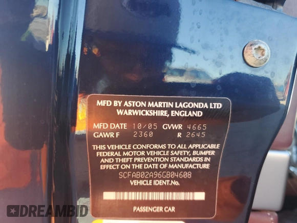 2006 Aston Martin DB9 z VIN SCFAB02A96GB04608, wystawiony jako Copart lot #76550654 z przebiegiem Nie podano mil oraz Nie do naprawy. Historia ofert i sprzedaży dostępna na DreamBid. Obrazek 12.