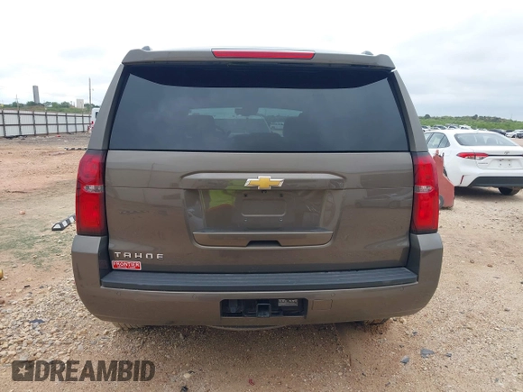 2015 Chevrolet Tahoe LT z VIN 1GNSCBKC2FR685780, wystawiony jako IAAI lot #42354130 z przebiegiem 101 617 mil mil oraz . Historia ofert i sprzedaży dostępna na DreamBid. Obrazek 16.