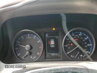 2018 Toyota RAV4 LE z VIN JTMBFREV2JJ249752, wystawiony jako Copart lot #58369165 z przebiegiem 69 474 mil mil oraz Szkoda całkowita • Salvage title. Historia ofert i sprzedaży dostępna na DreamBid. Obrazek 9.