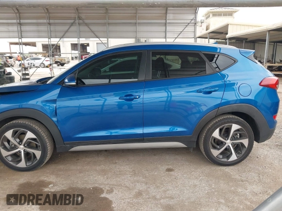 2018 Hyundai Tucson Sport with VIN KM8J33AL0JU803368, listed as a IAAI auction lot 41937235 with 64,163 mi miles and . Bid and sale history available at DreamBid. Image 15.