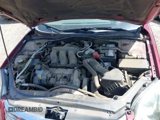 2007 Ford Fusion SEL with VIN 3FAHP08117R102788, listed as a IAAI auction lot 41969561 with 174,678 mi miles. Bid and sale history available at carsss.com. Image 10.