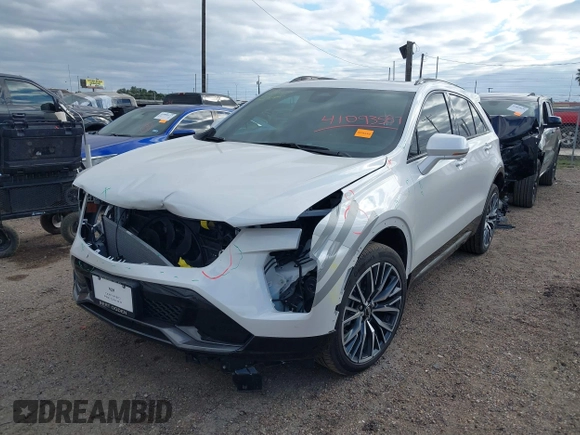2024 Cadillac XT4 FWD Sport with VIN 1GYFZER48RF180481, listed as a IAAI auction lot 41093587 with 3,982 mi miles and . Bid and sale history available at DreamBid. Image 18.
