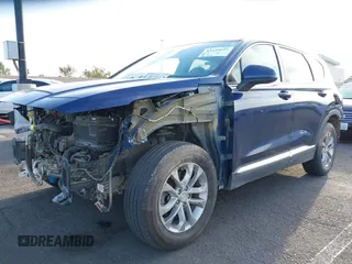 2019 Hyundai Santa Fe SE z VIN 5NMS23AD8KH096209, wystawiony jako IAAI lot #42235035 z przebiegiem 76 543 mil mil oraz . Historia ofert i sprzedaży dostępna na DreamBid. Obrazek 18.