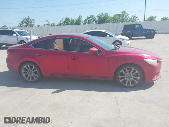 2014 Mazda 6 i Grand Touring with VIN JM1GJ1W65E1141953, listed as a IAAI auction lot 42027145 with 187,514 mi miles and . Bid and sale history available at DreamBid. Image 13.