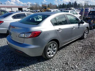 2011 Mazda Mazda3 i Sport with VIN JM1BL1UG4B1480828, listed as a IAAI auction lot 41868170 with 136,876 mi miles. Bid and sale history available at carsss.com. Image 4.