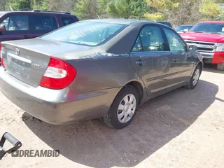 2004 Toyota Camry LE with VIN 4T1BE32K24U895575, listed as a IAAI auction lot 42067190 with 283,333 mi miles. Bid and sale history available at carsss.com. Image 4.