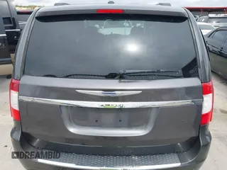2014 Chrysler Town & Country Touring L with VIN 2C4RC1CG7ER300693, listed as a IAAI auction lot 41849463 with 174,203 mi miles and . Bid and sale history available at carsss.com. Image 16.