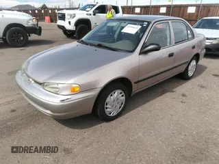 1998 Chevrolet Prizm Lsi z VIN 1Y1SK5285WZ438757, wystawiony jako IAAI lot #41896020 z przebiegiem 106 369 mil mil oraz . Historia ofert i sprzedaży dostępna na DreamBid. Obrazek 2.