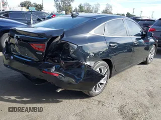 2020 Honda Insight Touring with VIN 19XZE4F91LE010778, listed as a IAAI auction lot 41430937 with 29,454 mi miles and . Bid and sale history available at carsss.com. Image 4.