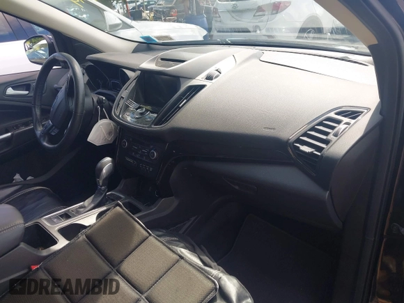 2018 Ford Escape Titanium with VIN 1FMCU9J94JUC98805, listed as a IAAI auction lot 42718214 with 36,689 mi miles and . Bid and sale history available at DreamBid. Image 5.