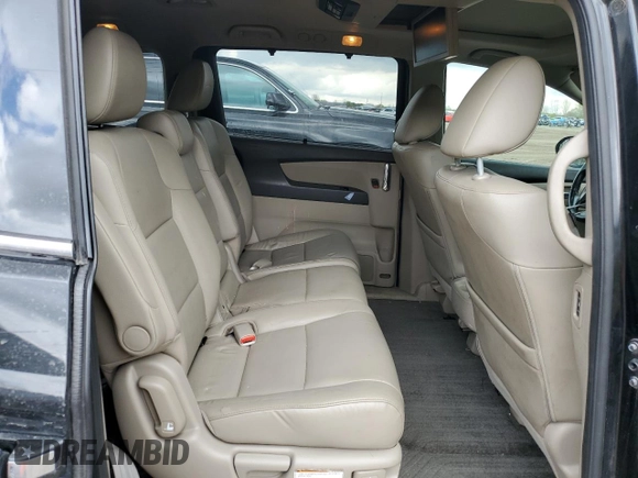 2014 Honda Odyssey Touring z VIN 5FNRL5H97EB508649, wystawiony jako Copart lot #55665245 z przebiegiem 162 892 mil mil oraz Czysty tytuł • Clean title. Historia ofert i sprzedaży dostępna na DreamBid. Obrazek 11.