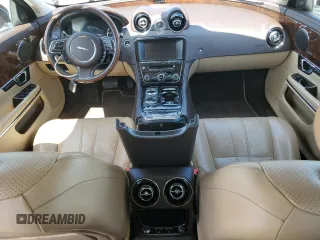 2014 Jaguar XJ with VIN SAJWA1CZ3E8V69877, listed as a Copart auction lot 51520405 with 57,567 mi miles and Clean Title. Bid and sale history available at DreamBid. Image 8.