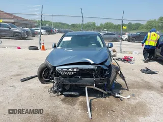 2017 Infiniti Q50 Premium z VIN JN1EV7AR1HM834900, wystawiony jako IAAI lot #42435638 z przebiegiem 76 937 mil mil oraz . Historia ofert i sprzedaży dostępna na DreamBid. Obrazek 13.