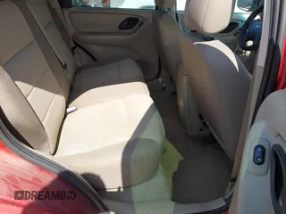 2006 Ford Escape XLS z VIN 1FMYU02Z96KA47068, wystawiony jako IAAI lot #42588037 z przebiegiem 139 581 mil mil oraz . Historia ofert i sprzedaży dostępna na DreamBid. Obrazek 8.
